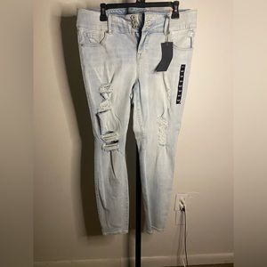 Light blue Jean with holes on both pant leg